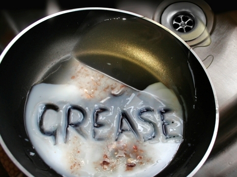 A pipe clogged with thick fats, oil and grease, also known as FOG
